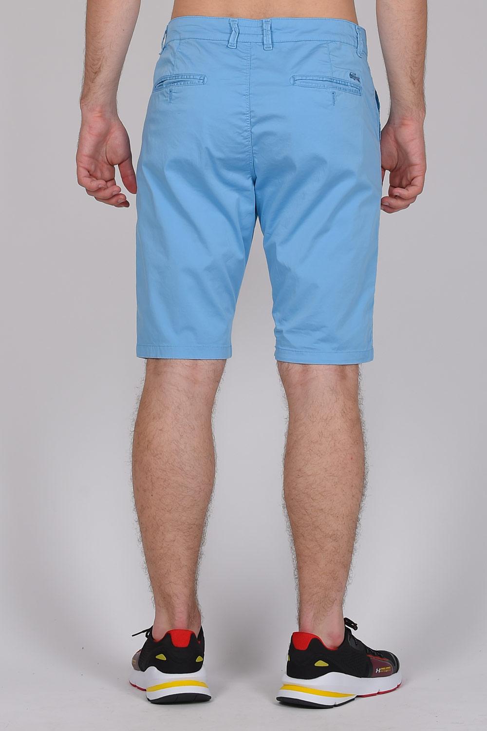 turquoise lacoste shorts